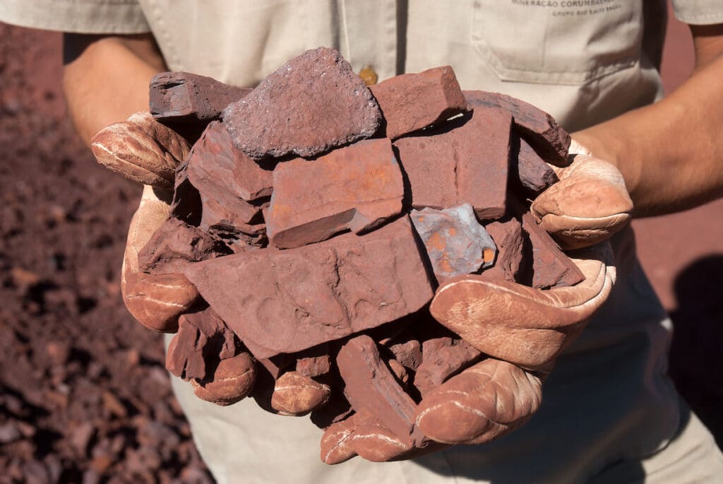 Iron ore price forecast slashed by 18 per cent